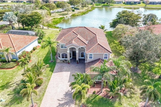 drone / aerial view with a water view