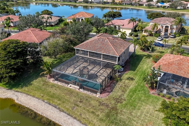 drone / aerial view with a water view