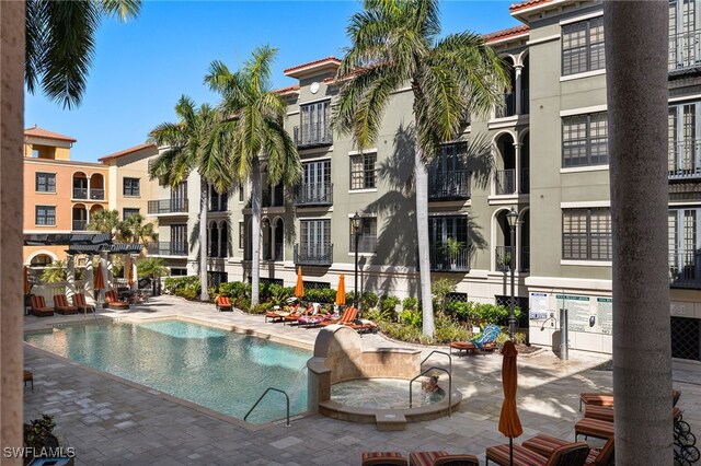 23159 Amgci Way Unit 3105, Estero, FL 33928 - community pool with a patio