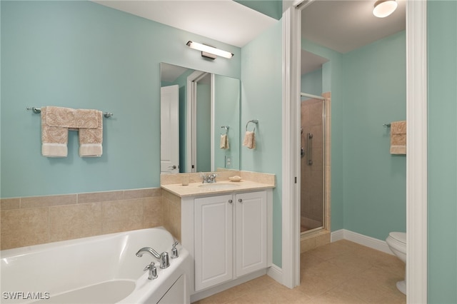 full bath with vanity, a garden tub, toilet, and a shower stall