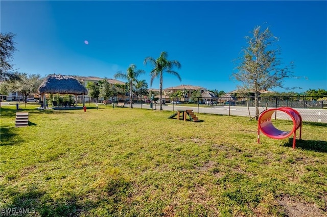 view of home's community with a gazebo and a lawn