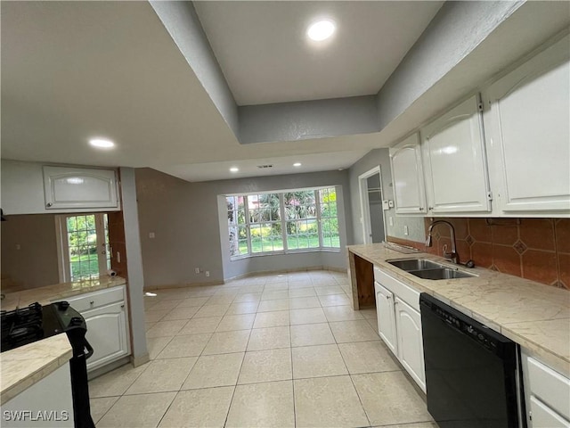 kitchen featuring sink, light tile patterned floors, white cabinetry, black dishwasher, and decorative backsplash