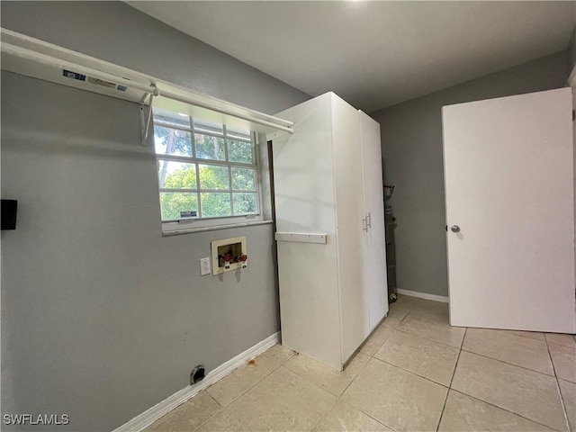 bathroom with tile patterned flooring