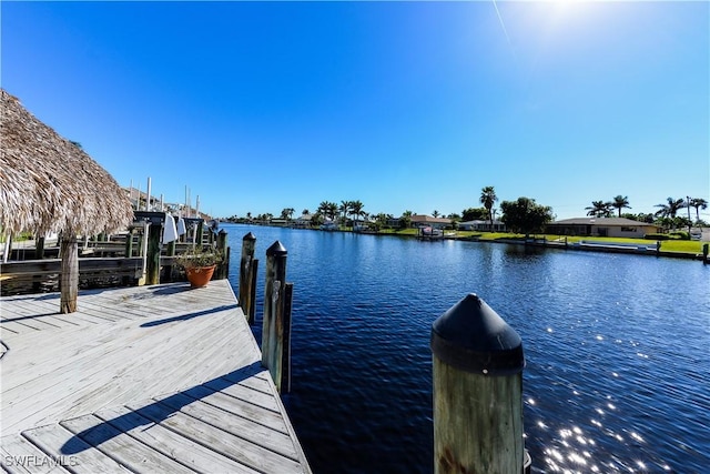 view of dock with a water view