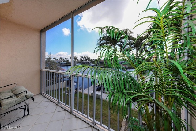 balcony featuring a water view