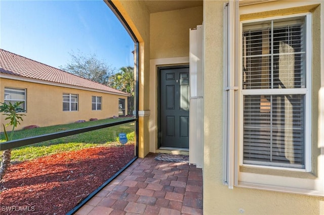 entrance to property featuring a balcony