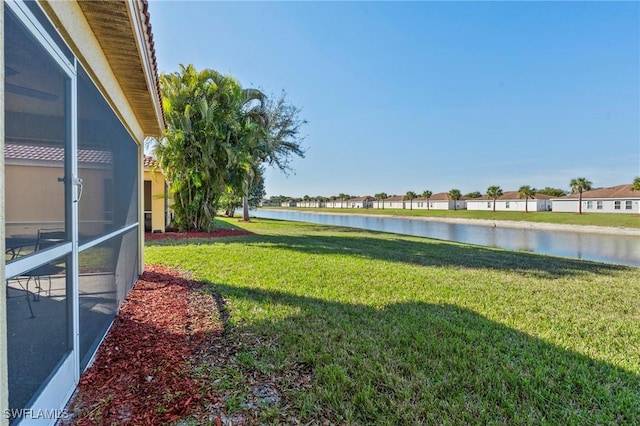 view of yard featuring a water view