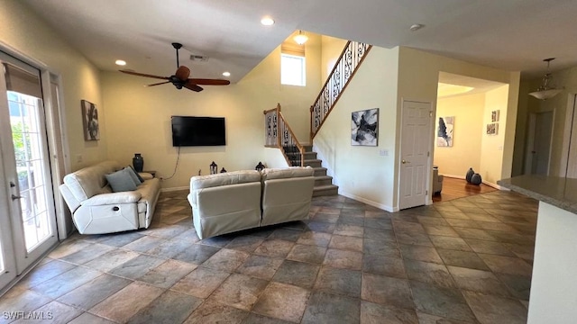 living room with ceiling fan