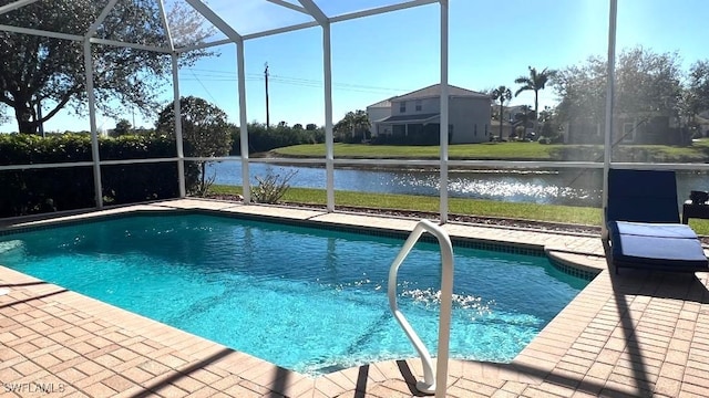 view of swimming pool featuring a lanai and a water view