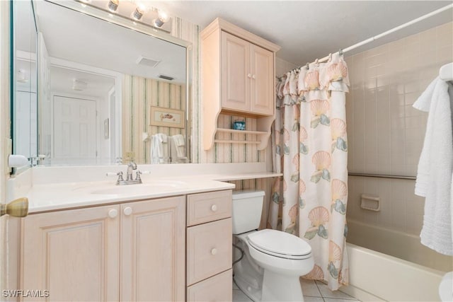 full bathroom with tile patterned flooring, vanity, shower / bathtub combination with curtain, and toilet