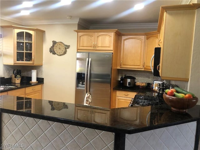 kitchen featuring tasteful backsplash, crown molding, appliances with stainless steel finishes, and kitchen peninsula