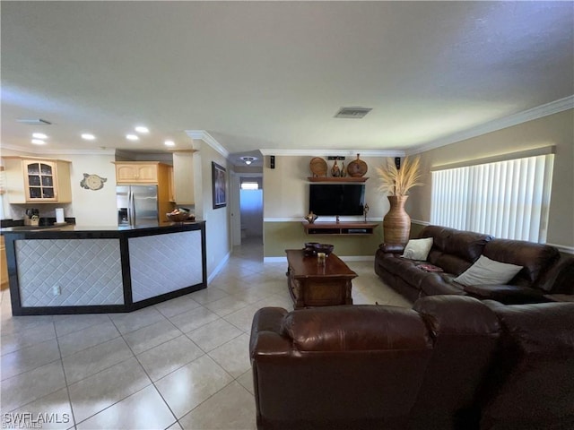 tiled living room featuring ornamental molding