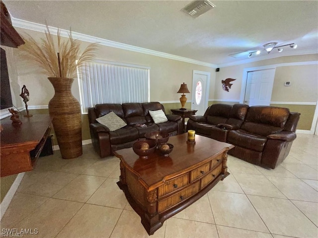 tiled living room featuring ornamental molding