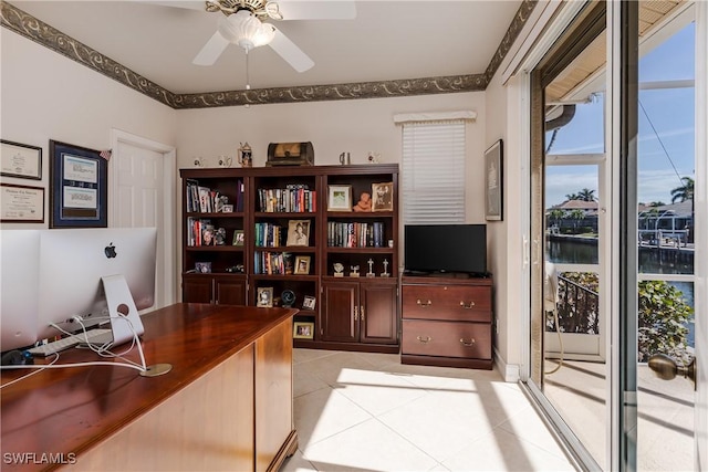 tiled home office with ceiling fan