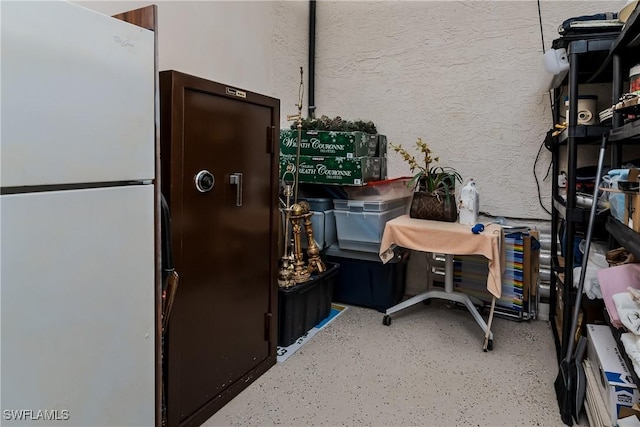 interior space featuring white fridge