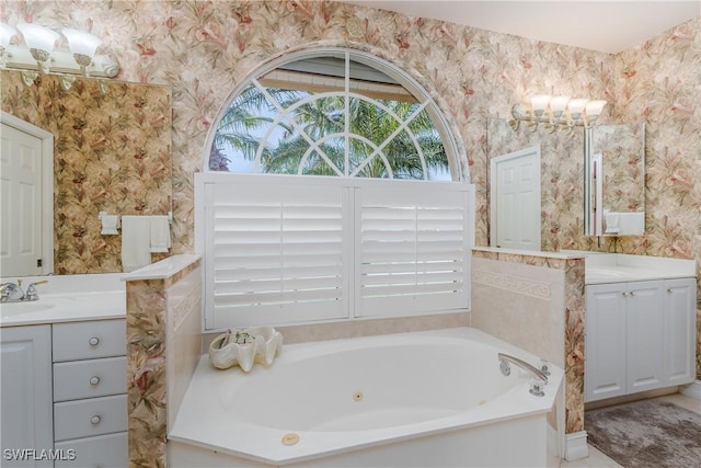 bathroom with vanity and a washtub