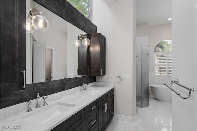 bathroom featuring vanity and a bathtub