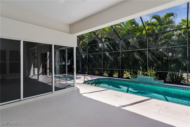 view of swimming pool with a patio