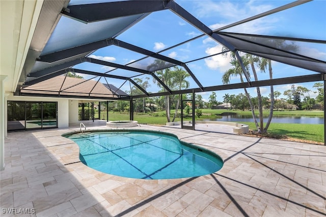 view of pool featuring a hot tub, a water view, a patio area, and a lanai