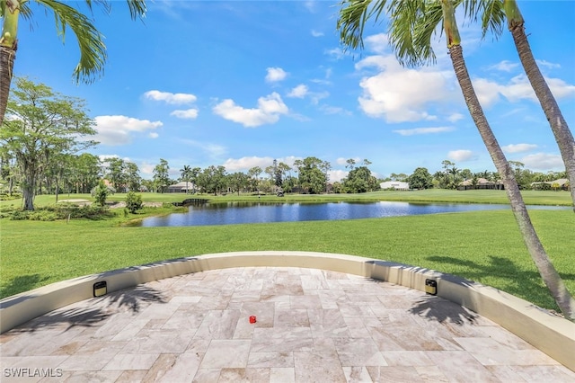 view of patio featuring a water view