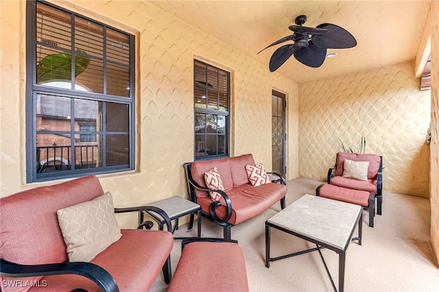 view of patio / terrace with ceiling fan and outdoor lounge area