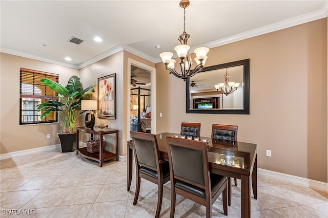 tiled dining room with ornamental molding and a notable chandelier