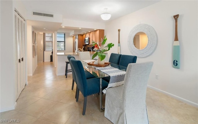 view of tiled dining area