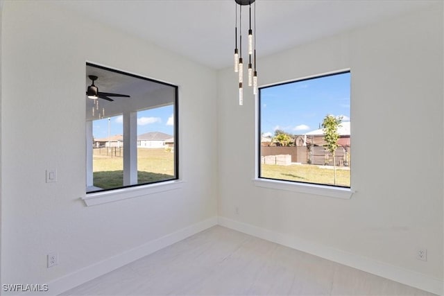 spare room with ceiling fan