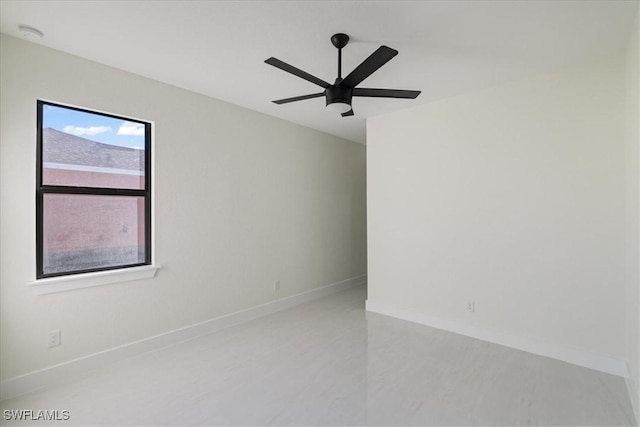 empty room featuring ceiling fan