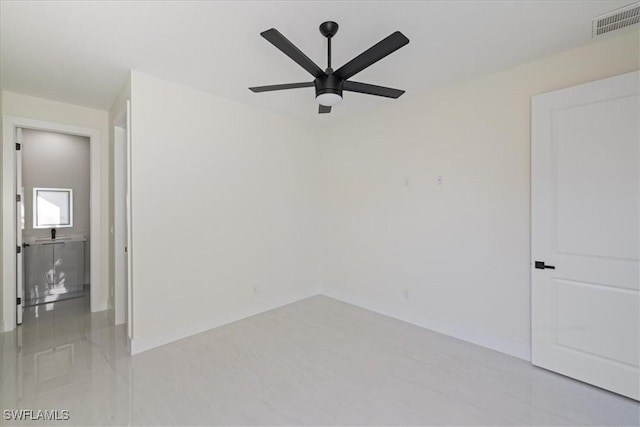 spare room featuring ceiling fan