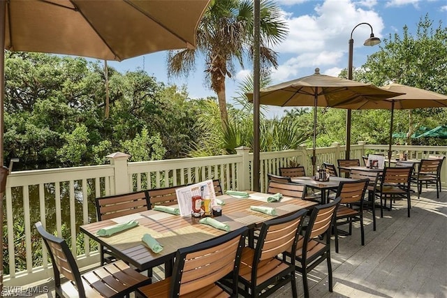 deck featuring outdoor dining space