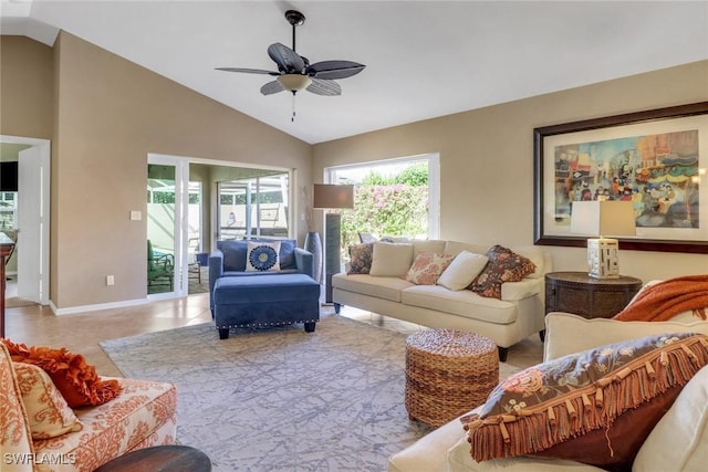 living room featuring ceiling fan, high vaulted ceiling, and light tile patterned floors