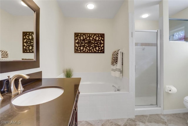 full bathroom featuring toilet, tile patterned floors, vanity, and shower with separate bathtub