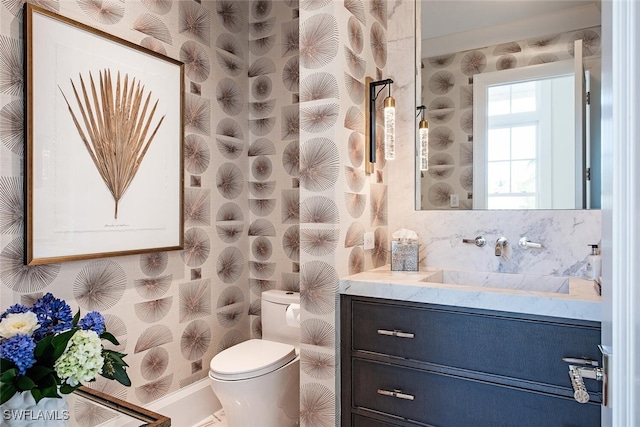 bathroom with vanity and toilet