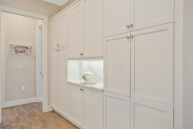 interior space with hardwood / wood-style floors