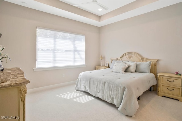 bedroom with light colored carpet