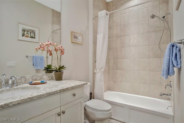 full bathroom featuring vanity, toilet, and shower / bath combo with shower curtain