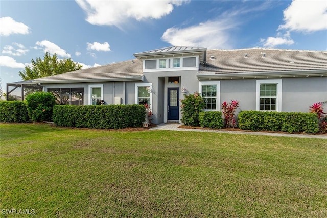 view of front facade featuring a front yard