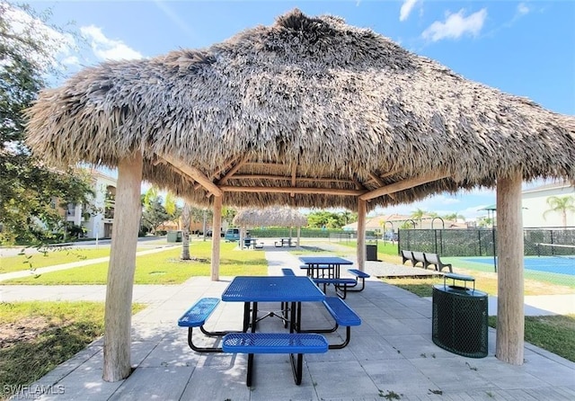 surrounding community featuring a yard and a gazebo