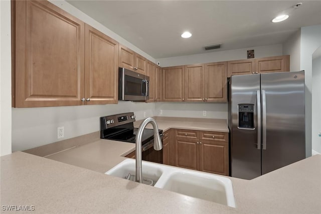 kitchen with stainless steel appliances and sink