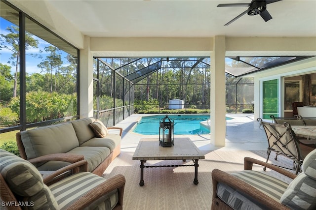 view of pool featuring ceiling fan