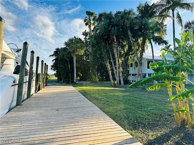 view of yard featuring a boat dock