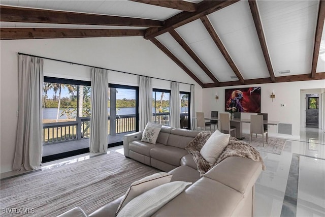 living room featuring a water view, beam ceiling, high vaulted ceiling, and a wealth of natural light