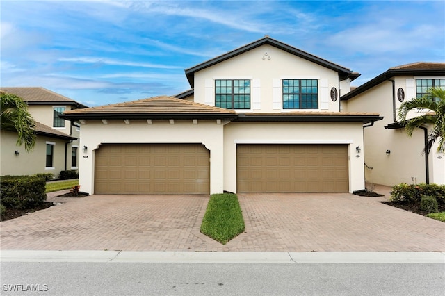 view of front of home with a garage