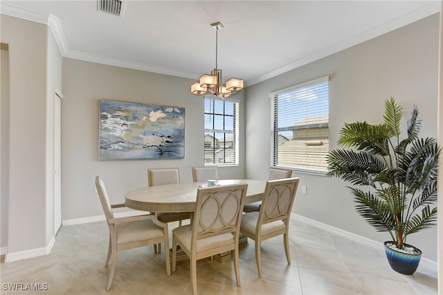 tiled dining space featuring an inviting chandelier and ornamental molding