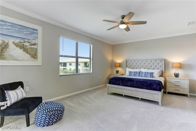 bedroom featuring light carpet, ornamental molding, and ceiling fan