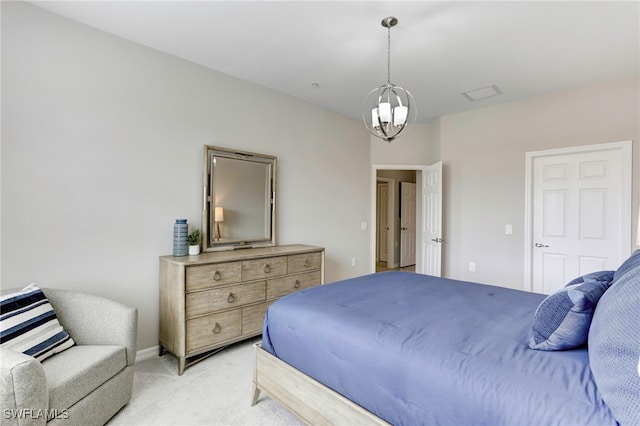 bedroom with light colored carpet and a notable chandelier