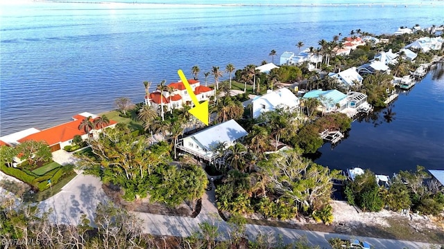 drone / aerial view featuring a water view