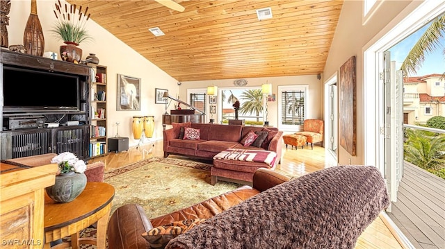 living room with high vaulted ceiling, light wood-type flooring, and wooden ceiling