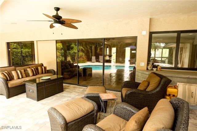 view of patio / terrace featuring outdoor lounge area and ceiling fan